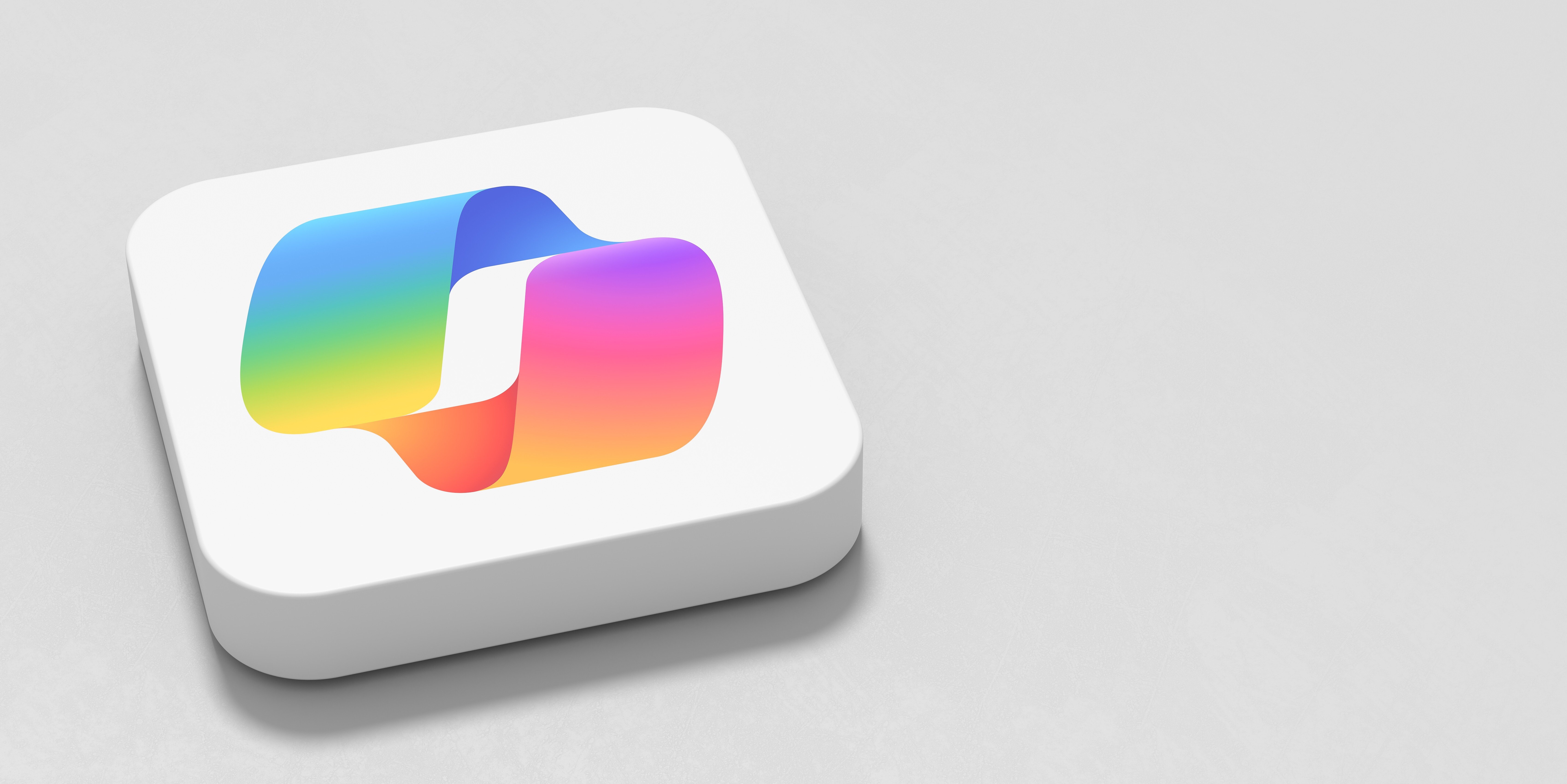 Microsoft Copilot App Icon on Gray Background with Copy Space