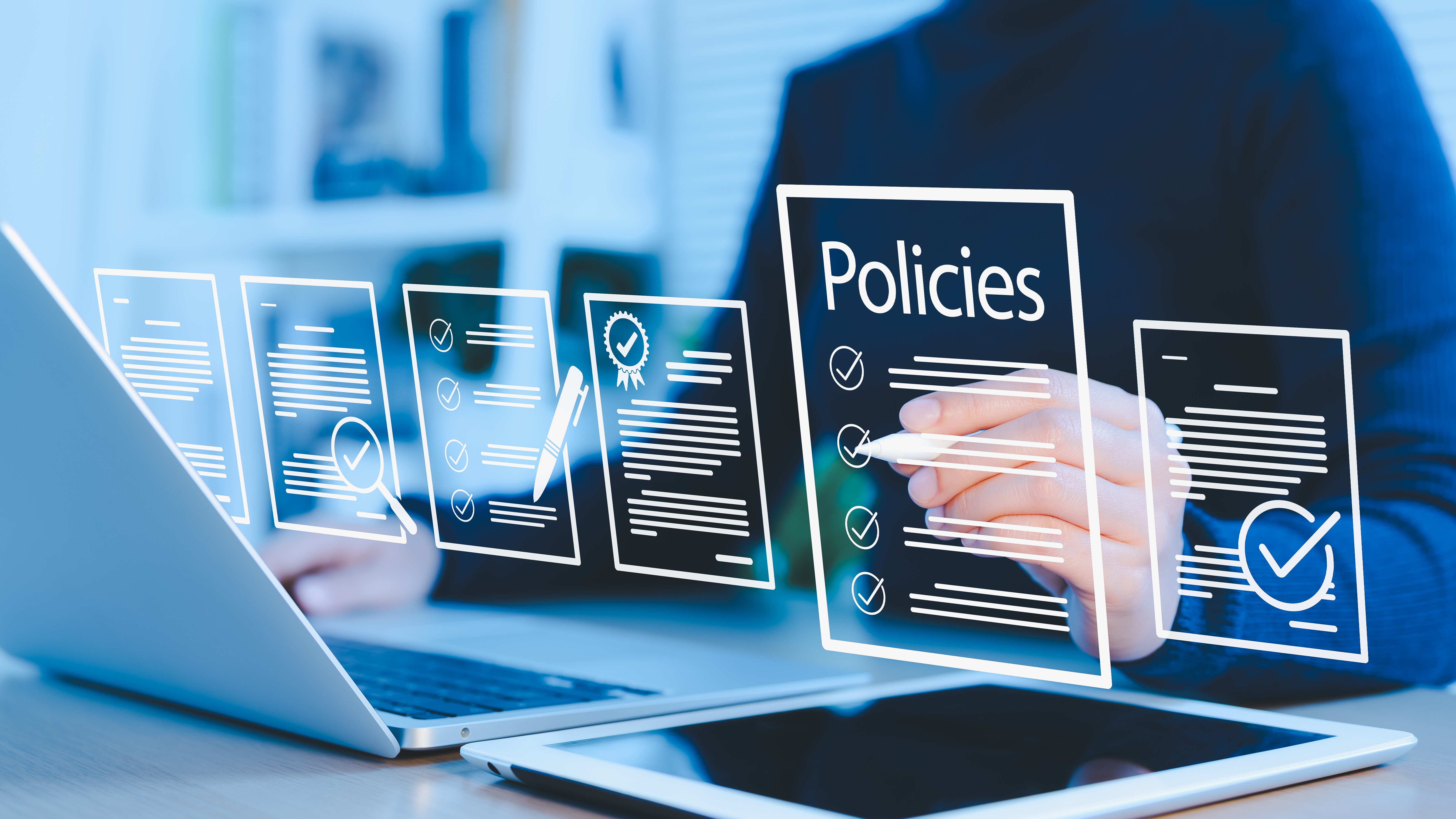 Businesswoman reviews digital document Policies with icons, checklists, certifications, and financial detail.