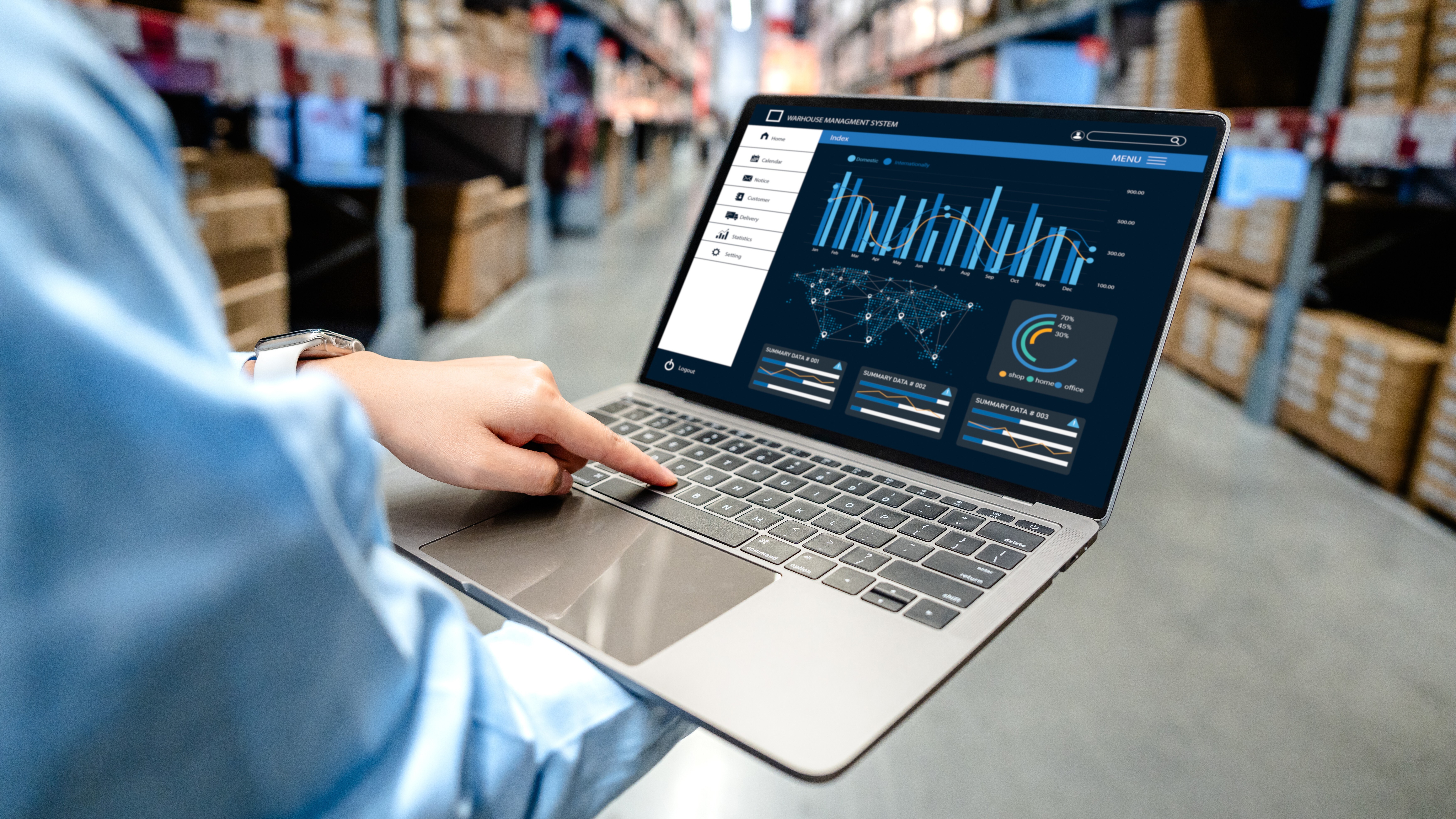 Supply Chain. Laptop in a warehouse tracking 